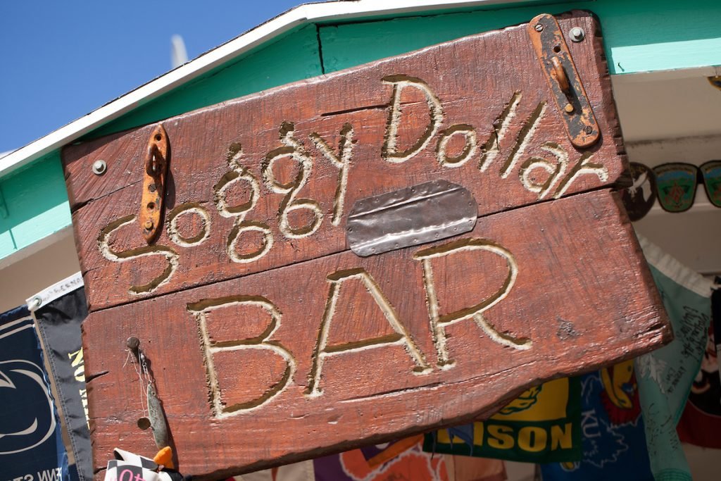 Rustic Wooden Sign For Soggy Dollar Bar Near Cruz Bay Watersports.