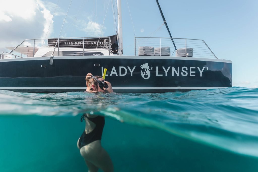 a diver with scuba gear showcasing underwater activity related to Cruz Bay watersports.