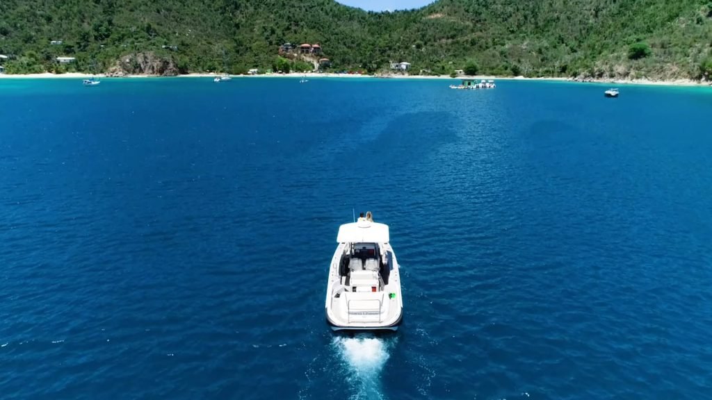 Tourists Snorkeling Around The Floating Taco Bar 'Lime Out' In Tropical Waters, Enjoying The Underwater Scenery And Surface Amenities